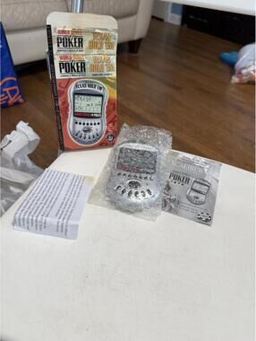 World Series of Poker Texas Hold 'Em Handheld Game Excalibur